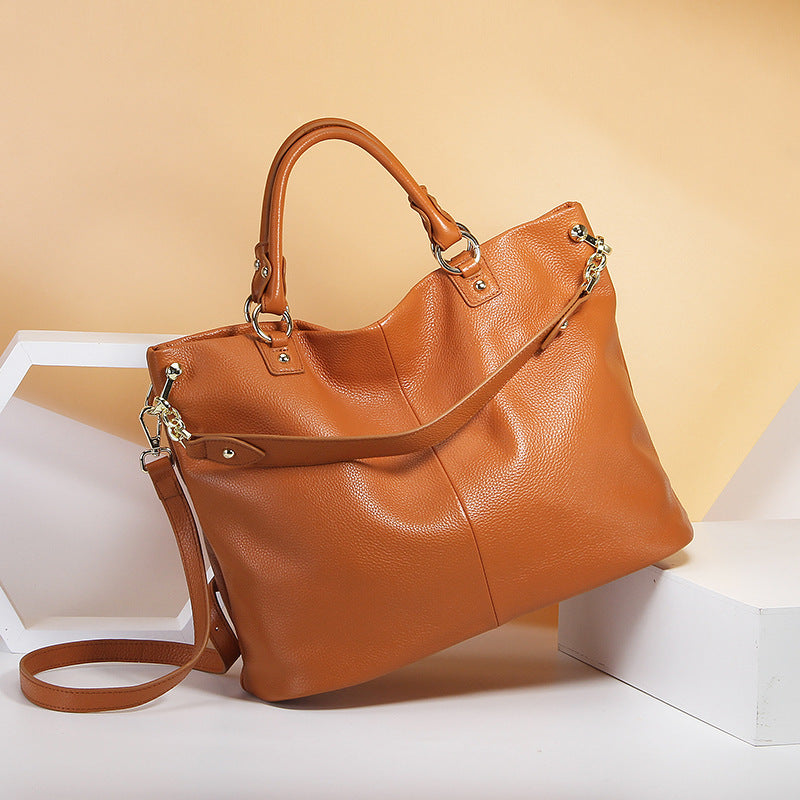 High-grade first layer cowhide leather handbags. Shoulder slung tote bag