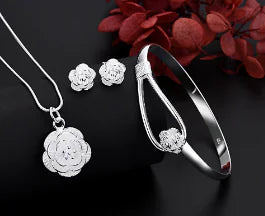 Silver Floral Charm Jewelry Set: Necklace, Bracelet, Earrings