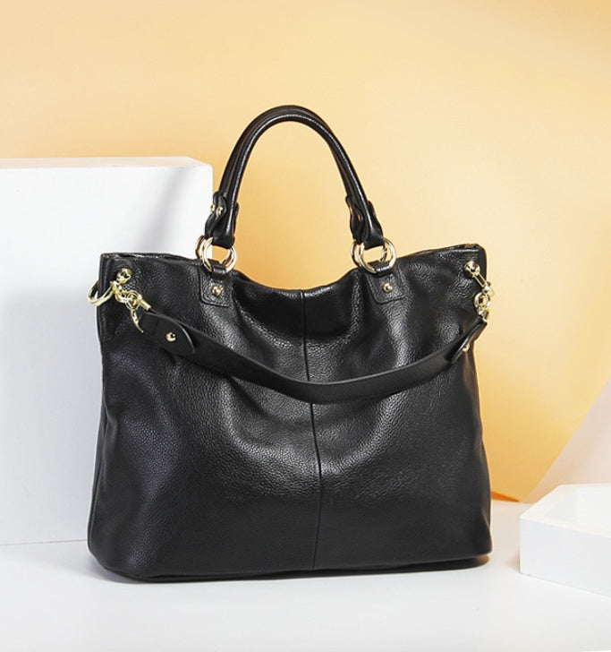 High-grade first layer cowhide leather handbags. Shoulder slung tote bag