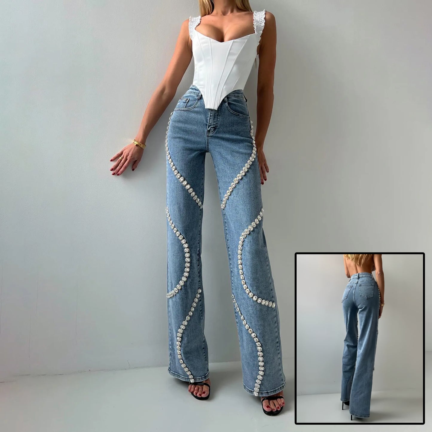 Loose Straight Leg Fashionable Casual Jeans. Pants With A Rhine Stone Denim Design Around Them.