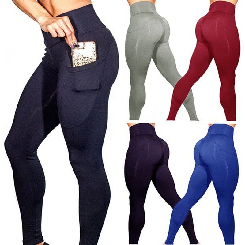Mobile phone pocket female solid color leggings. Elastic high waist yoga pants