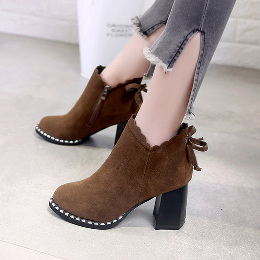 Female short autumn winter warm boots. Martin boots bows ornament high heels