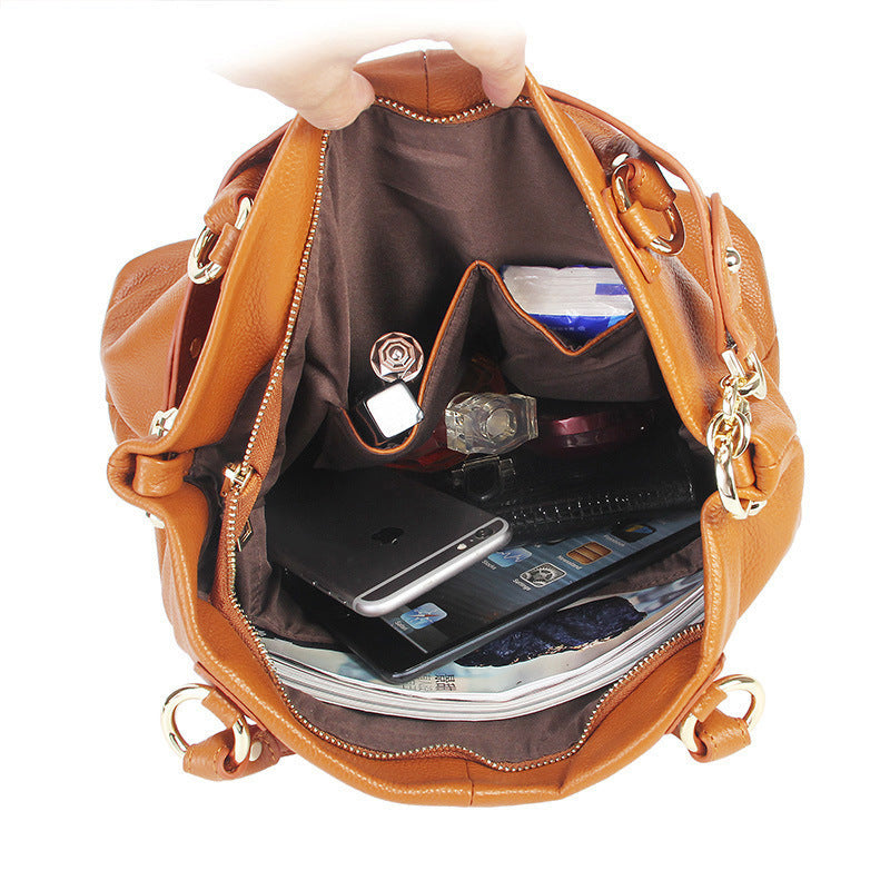 High-grade first layer cowhide leather handbags. Shoulder slung tote bag