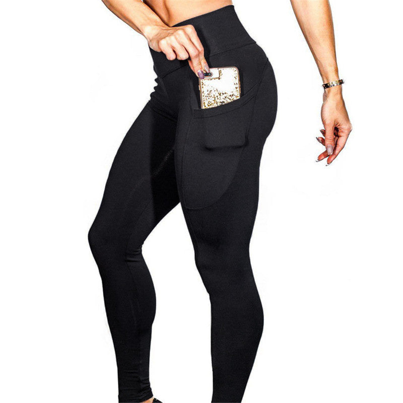 Mobile phone pocket female solid color leggings. Elastic high waist yoga pants