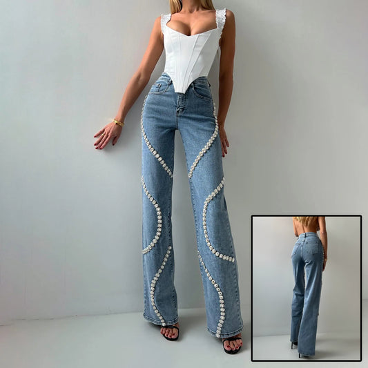 Loose Straight Leg Fashionable Casual Jeans. Pants With A Rhine Stone Denim Design Around Them.